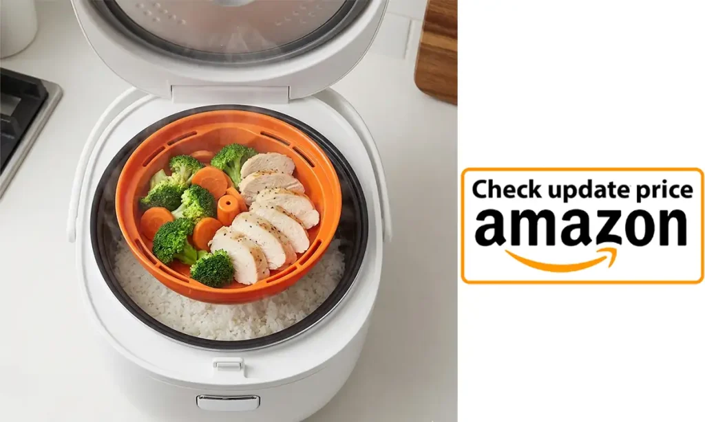 Tiger’s patented Tacook Synchro-cooking plate in action, steaming chicken and veggies directly above the rice.